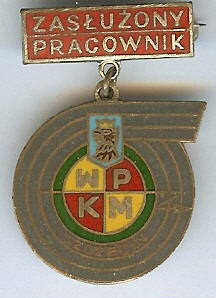Foto Janusz Światowy - odznaka zasłużonego pracownika WPKM
